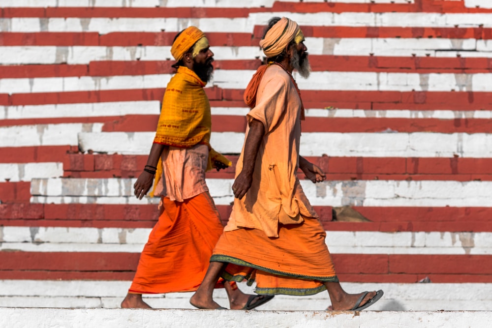 two men walking on street