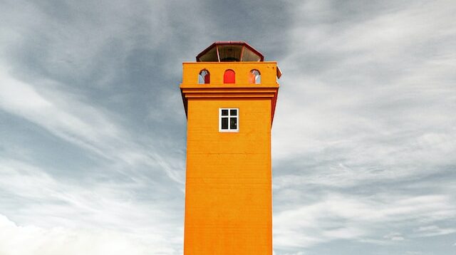 a lighthouse on a beach